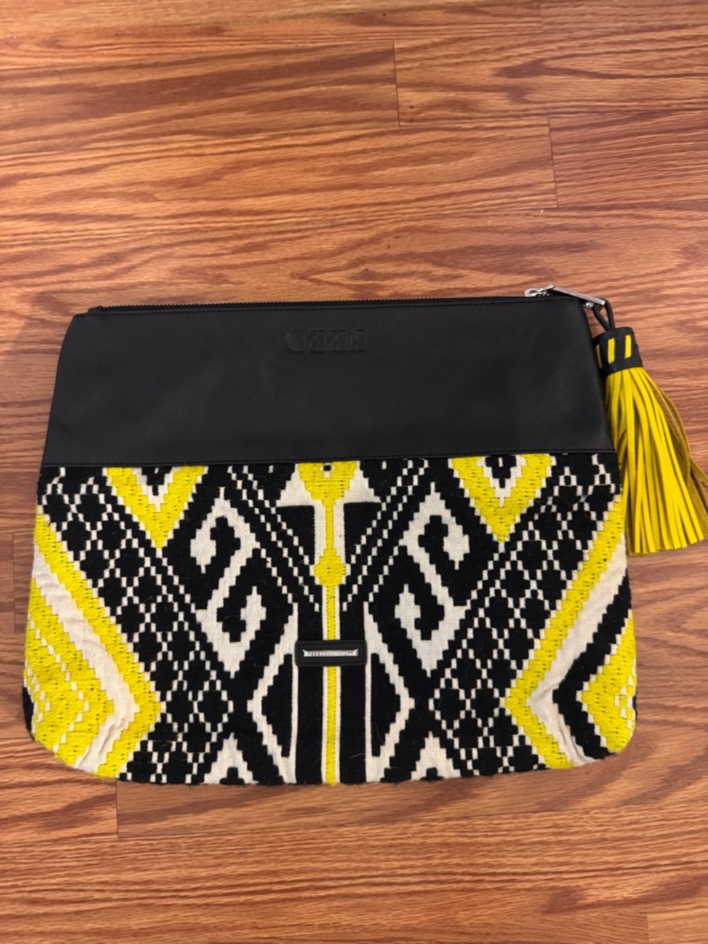 Rebecca Minkoff x FEED Black, Yellow & White Patterned Clutch with Tassel